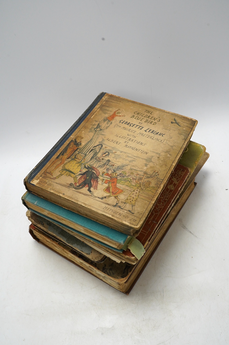 Leblanc, Georgette - The Children's Blue Bird....Translated by Alexander Teixeira De Mattos....pictorial title and 13 coloured plates (by Albert Rothenstein); original cloth backed coloured pictorial boards. 1913